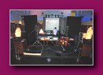 Small thumbnail of a stage with speakers and equipment set up in a hall